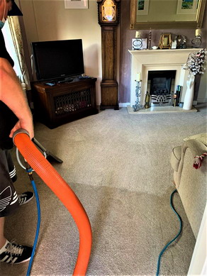 Steam cleaning a carpet in Warrington